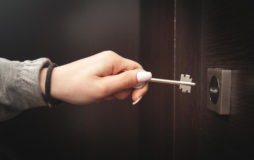 hand unlocking door with key